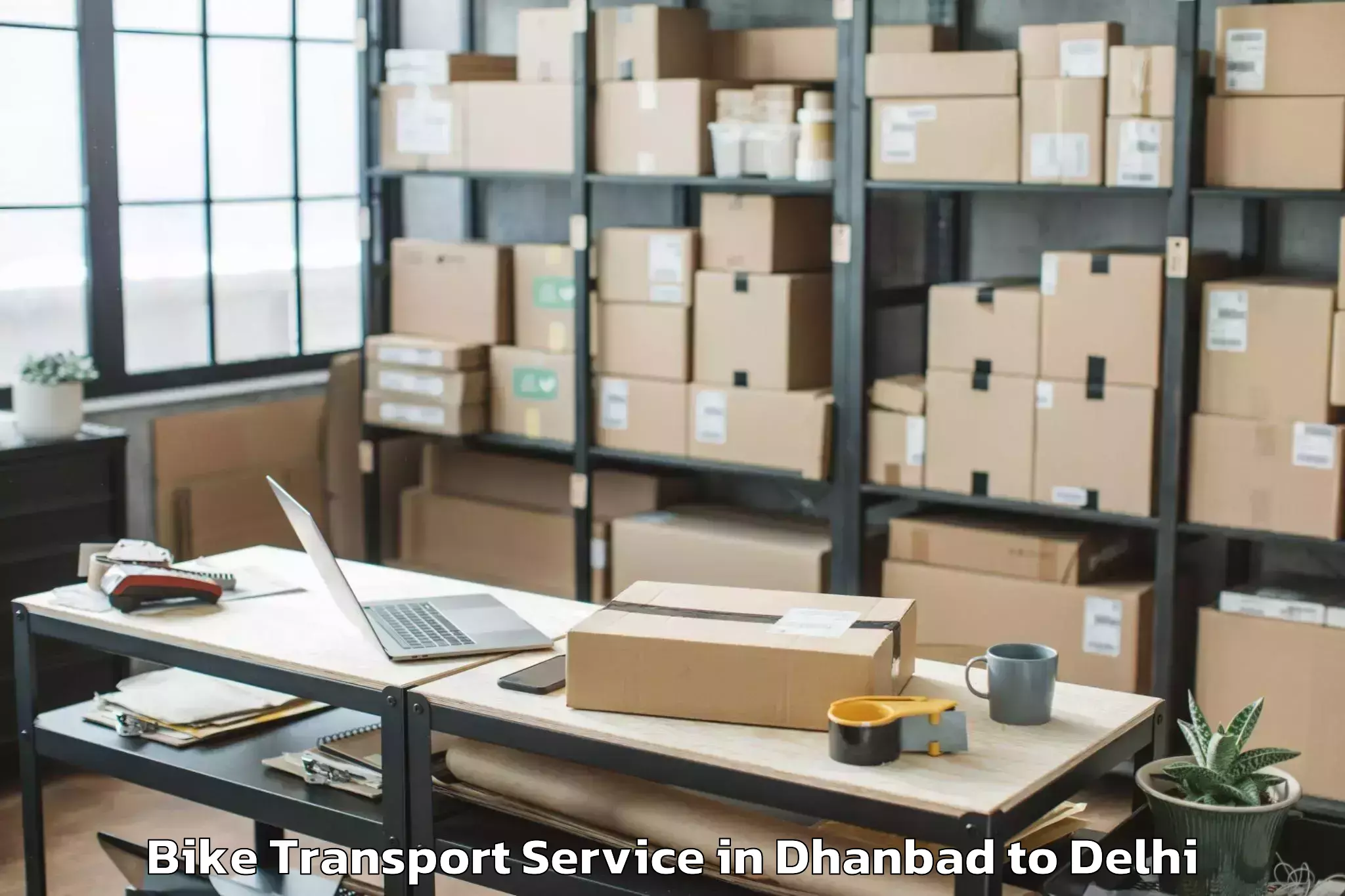 Book Dhanbad to Seema Puri Bike Transport